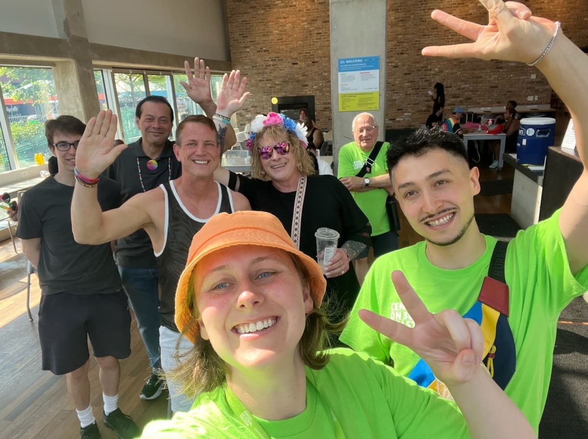 Volunteers working together at LGBTQ+ community center organizing food and supplies for local residents