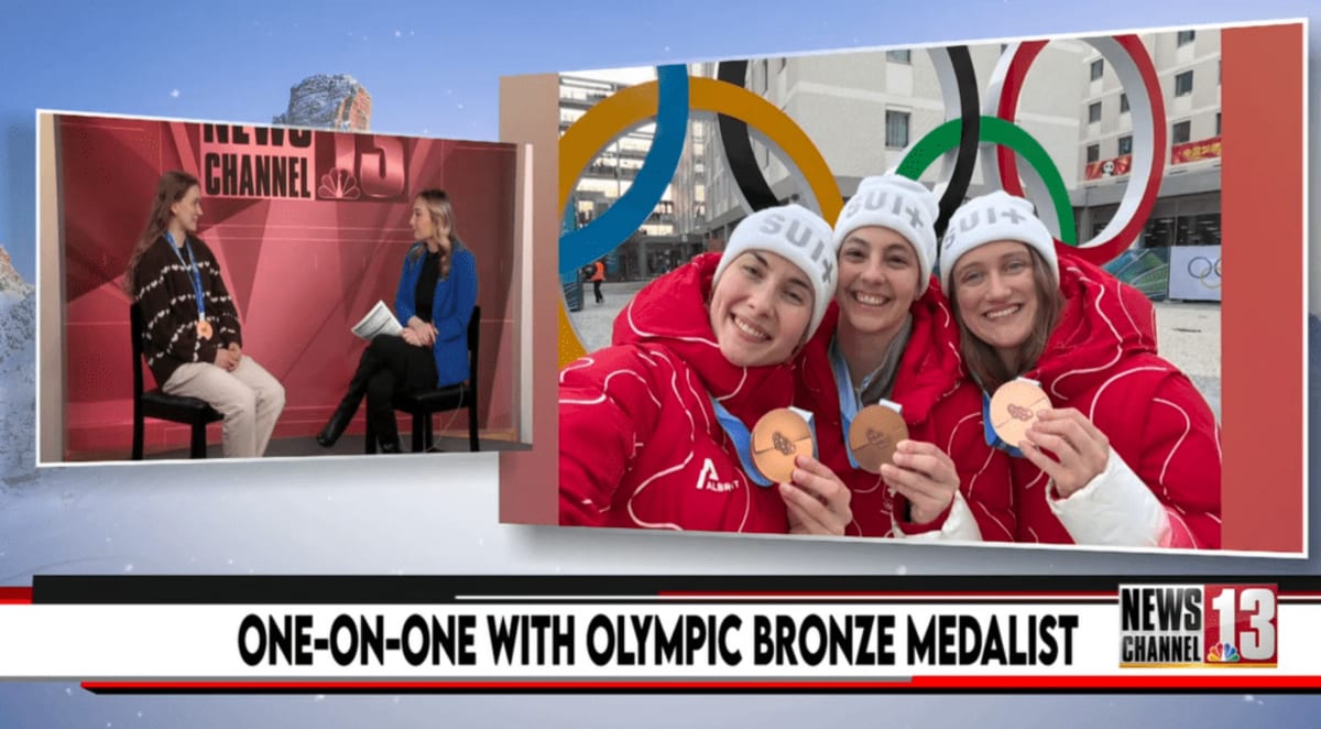 Union College goaltender Monja Wagner in hockey gear celebrating Olympic bronze medal victory