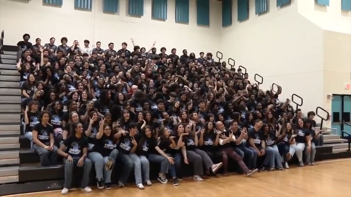 400 Students Surprise Teacher With Charity Gift