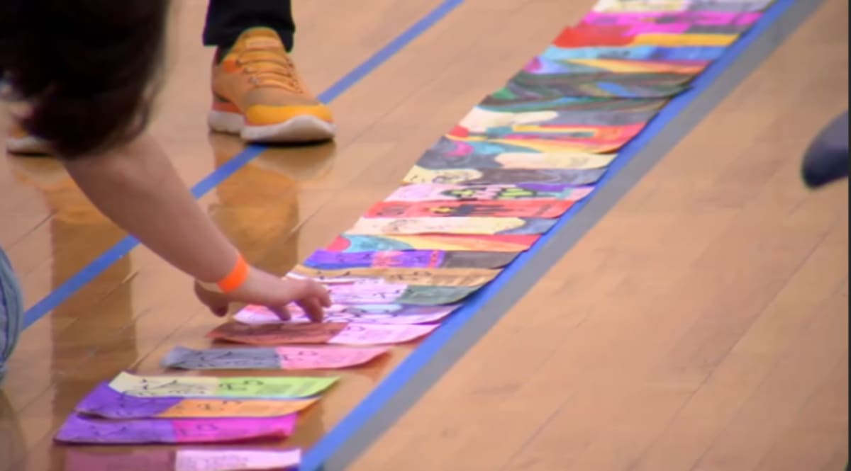 Utah School Colors 8,000 Pages for Kindness World Record - Image 2