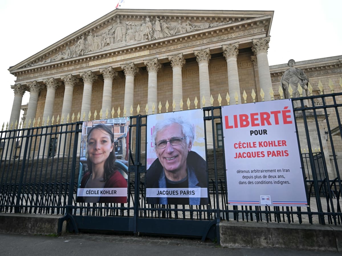 French nationals Cecile Kohler and Jacques Paris pictured before their detention in Iran