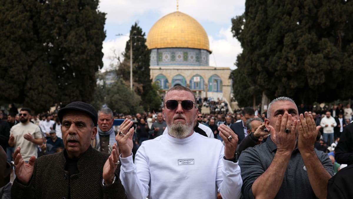 Worshippers gathering for Friday prayers at Al-Aqsa Mosque in Jerusalem's Old City