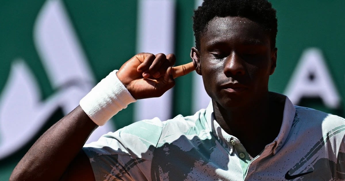 French teenager Moise Kouame celebrating his historic first round victory at Roland Garros tennis tournament