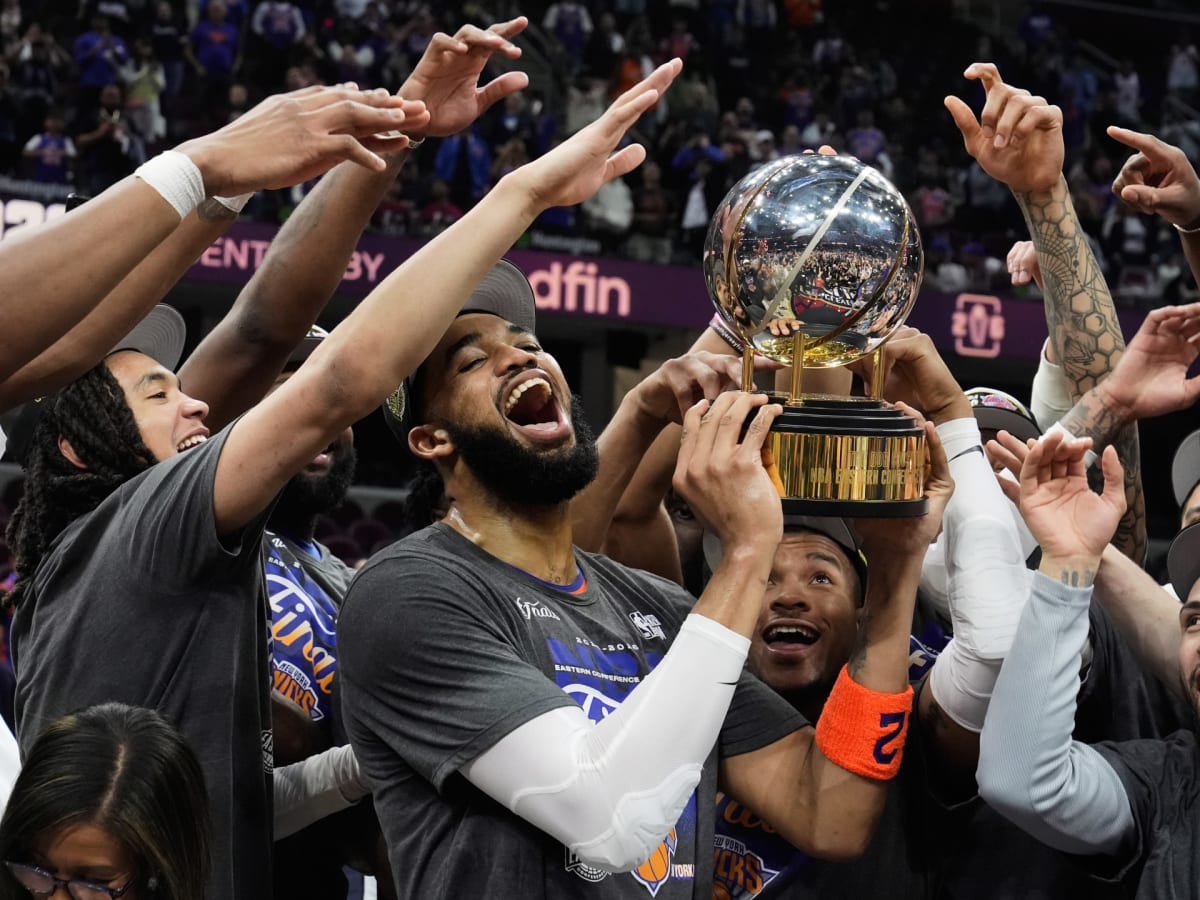 New York Knicks players celebrate together after winning Eastern Conference championship game