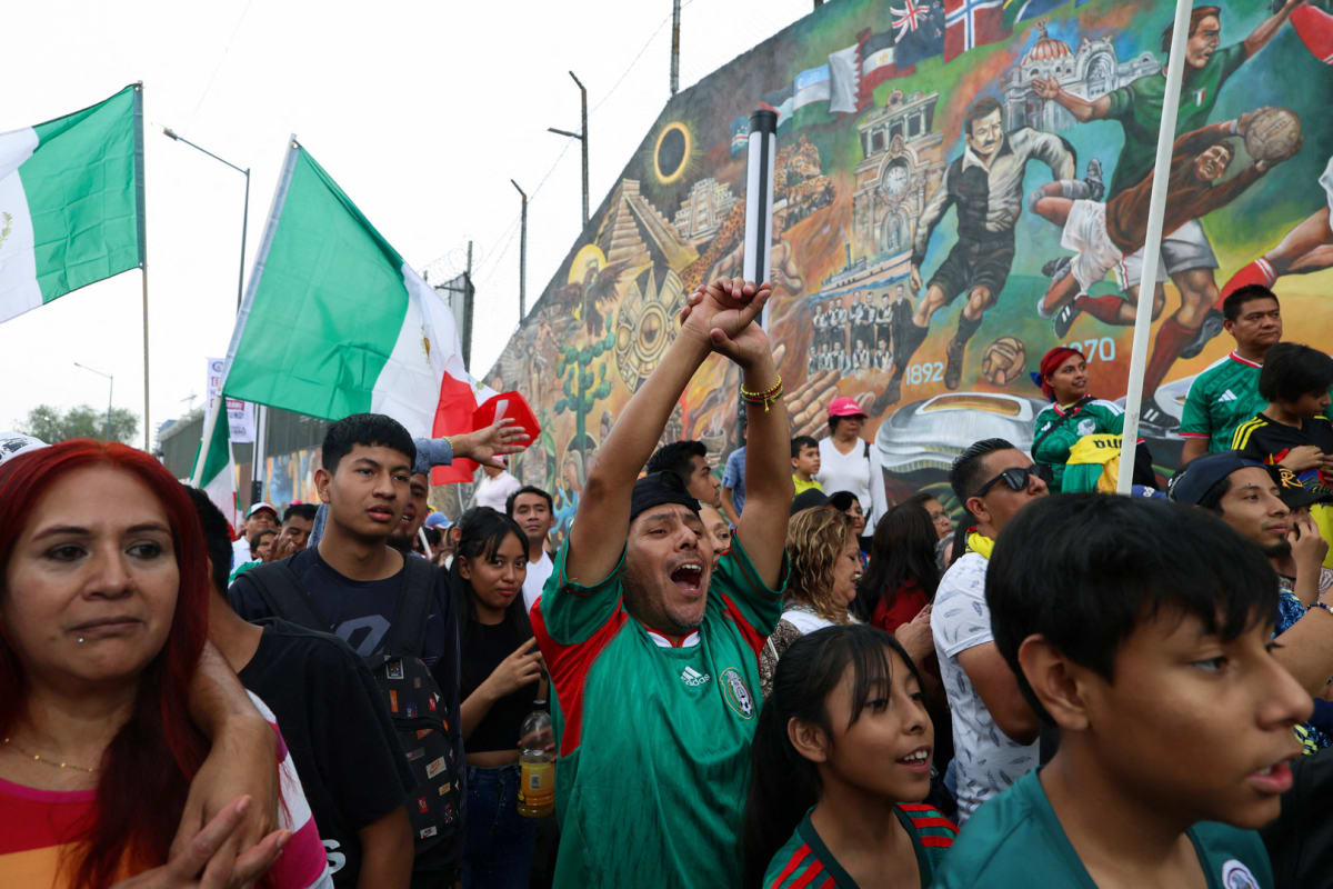 Massive colorful football mural painted on building wall in Mexico City celebrating Mexican football culture