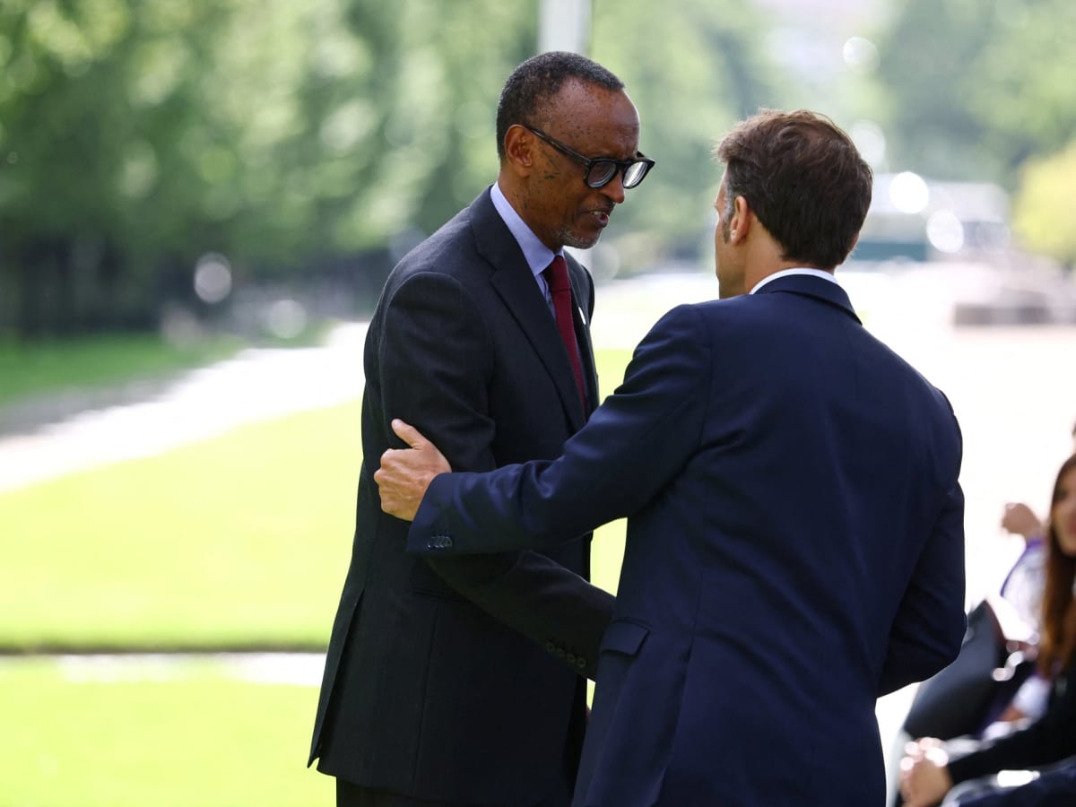 French President Macron and Rwandan President Kagame standing together at genocide memorial in Paris