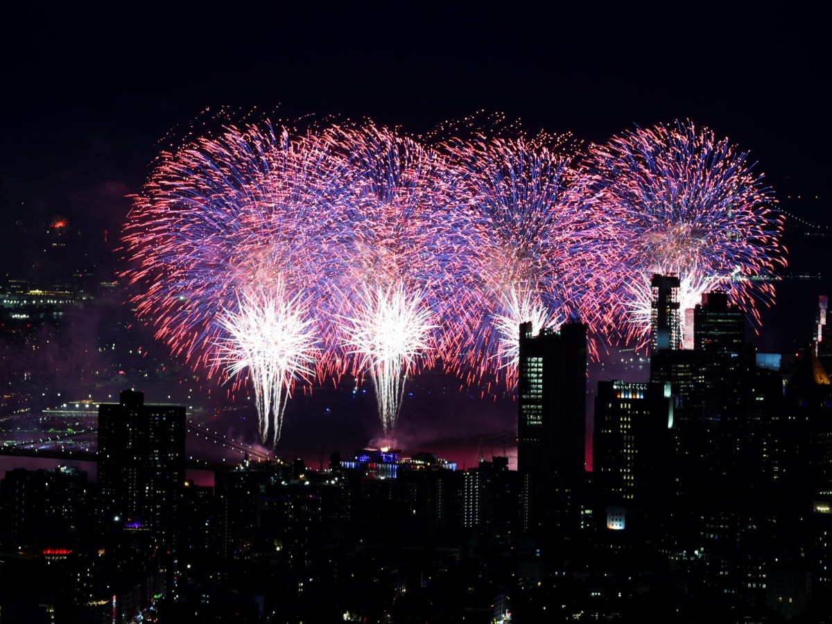 Colorful fireworks exploding over New York City skyline during America's 250th Independence Day celebration