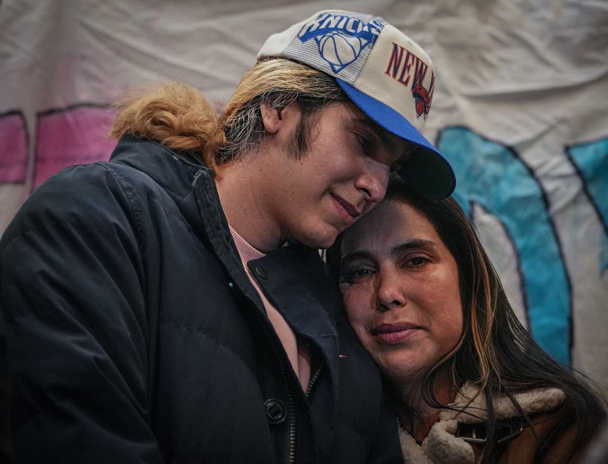 Dylan Lopez Contreras embracing his mother Raiza during emotional reunion in Manhattan church