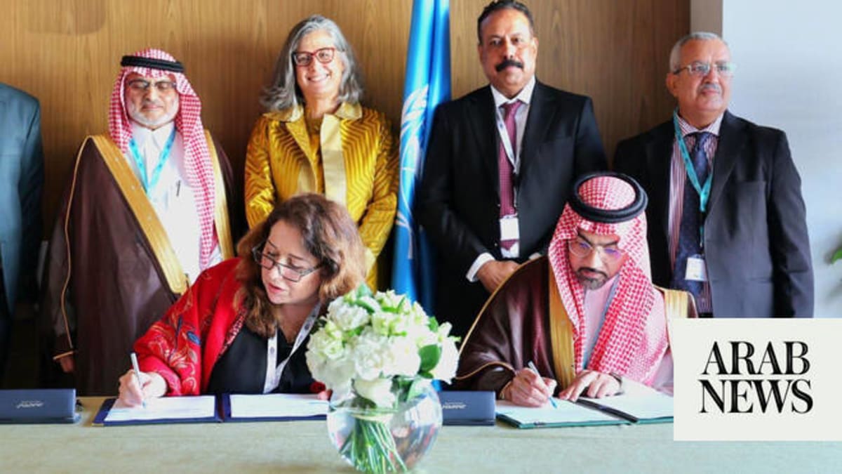 Saudi and UN-Habitat officials signing housing project agreement at World Urban Forum