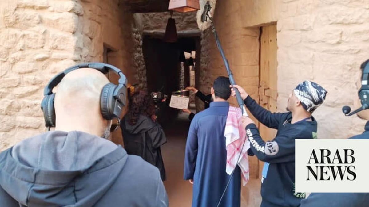 Film crew working on production set in AlUla, Saudi Arabia's desert landscape