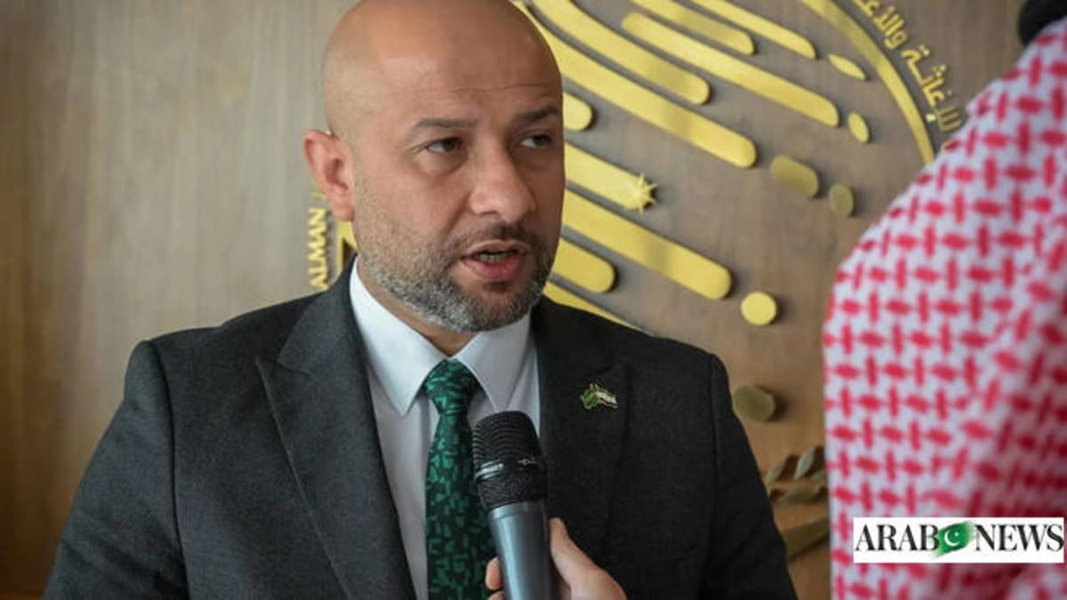 Syrian child with cochlear implant smiling during auditory rehabilitation therapy session