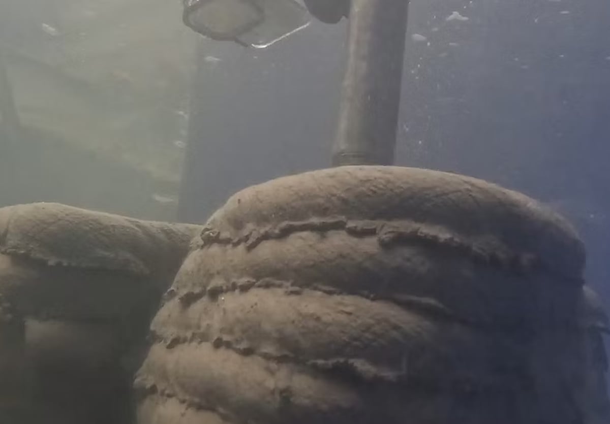 Underwater robotic 3D printer extruding concrete structure on ocean floor during construction demonstration