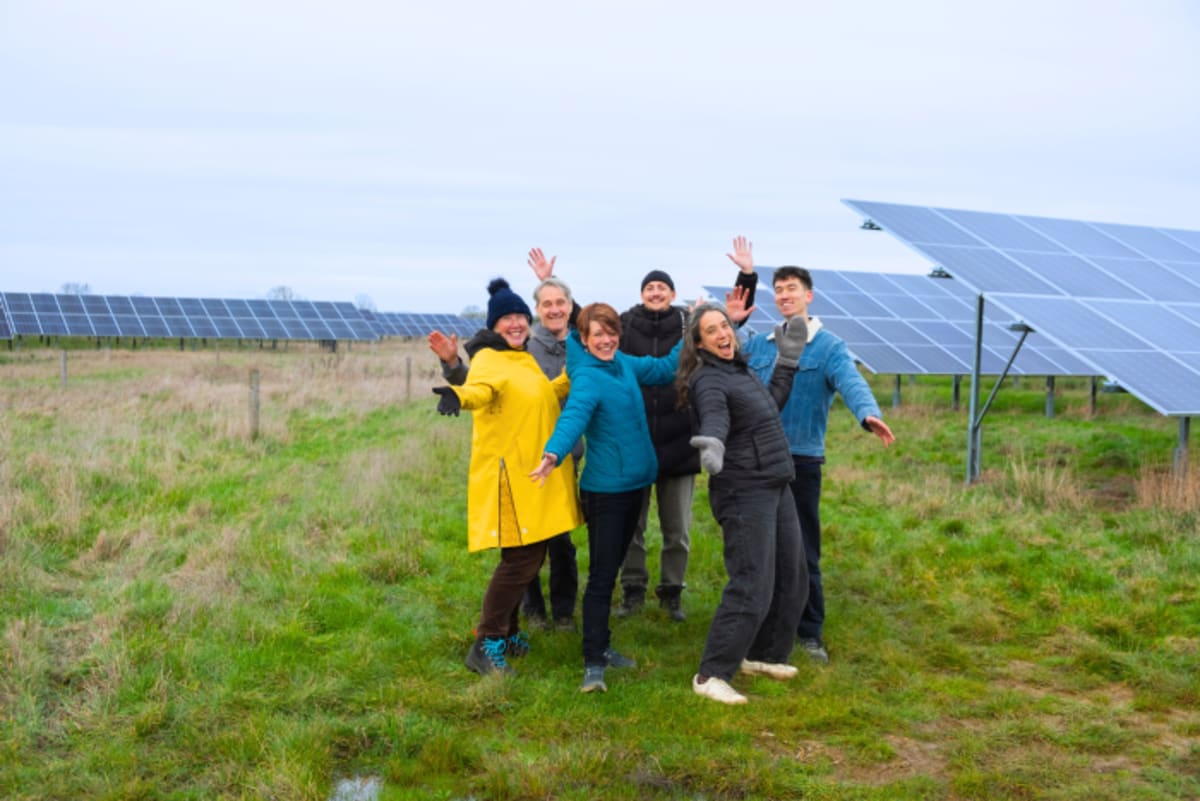 Solar panels at Ray Valley Solar Park in Oxfordshire with community battery storage facility