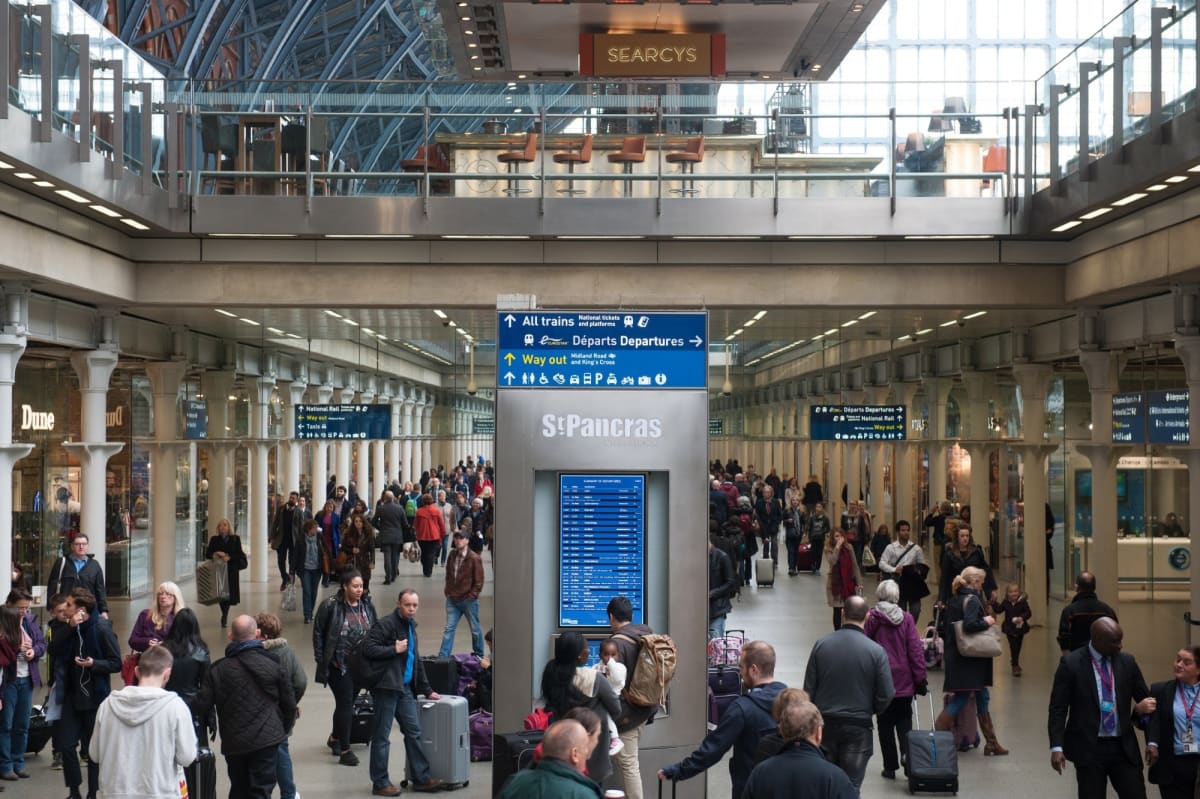 ** London St. Pancras International railway station exterior with high-speed trains serving passengers on sustainable travel routes