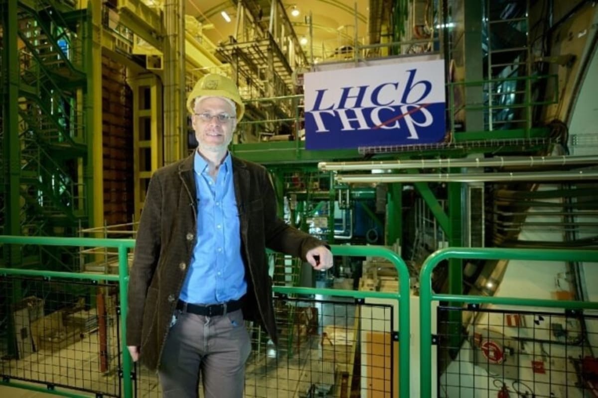 Artistic rendering of the Ξcc+ particle showing its three-quark composition at CERN's laboratory