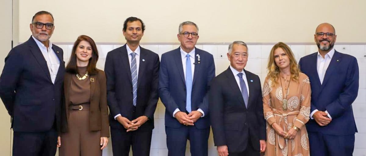 Scientists collaborating in modern laboratory developing vaccines and health innovations for global communities