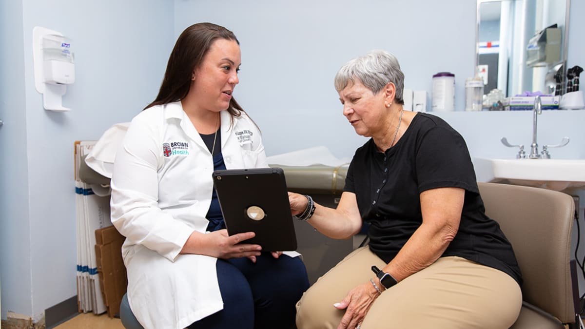Scientists working in modern research laboratory studying aging and disease treatments