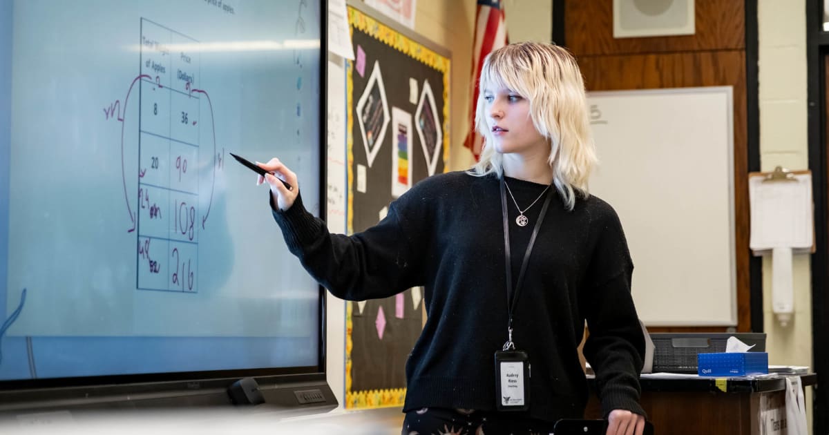 Ball State University Teachers College faculty and students collaborating with educational technology and AI tools