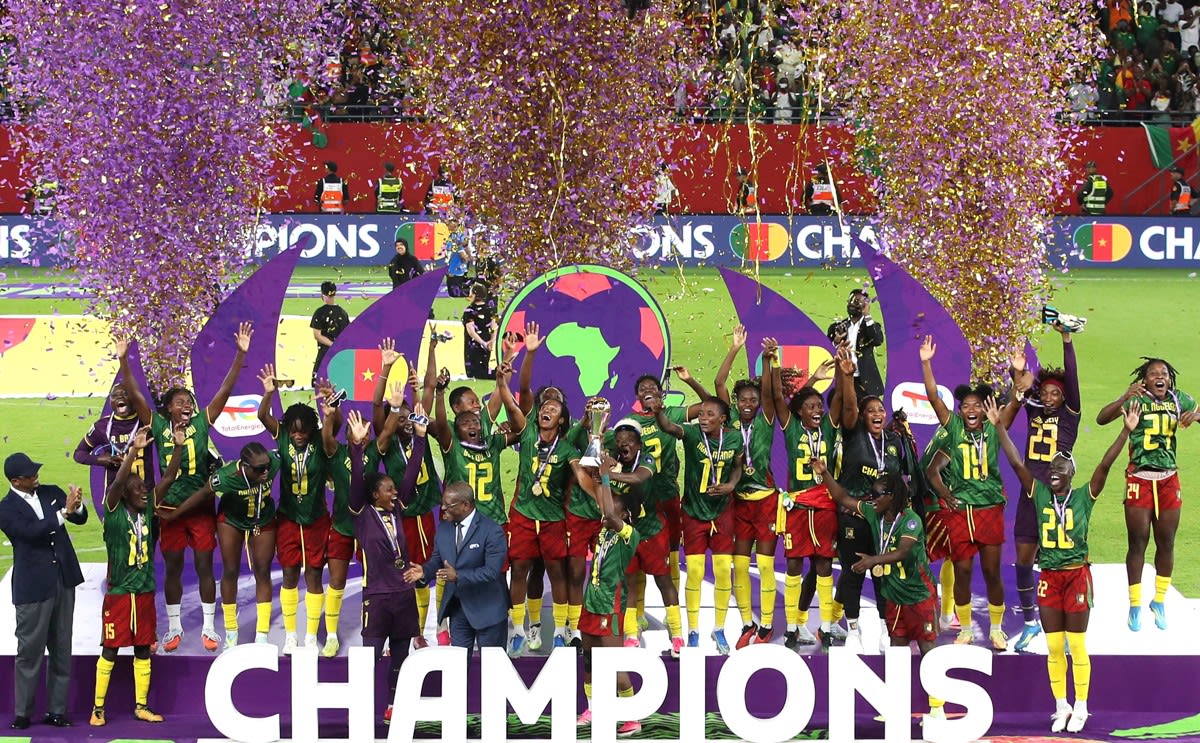 Cameroon women's football team celebrating their first Africa Cup of Nations championship victory