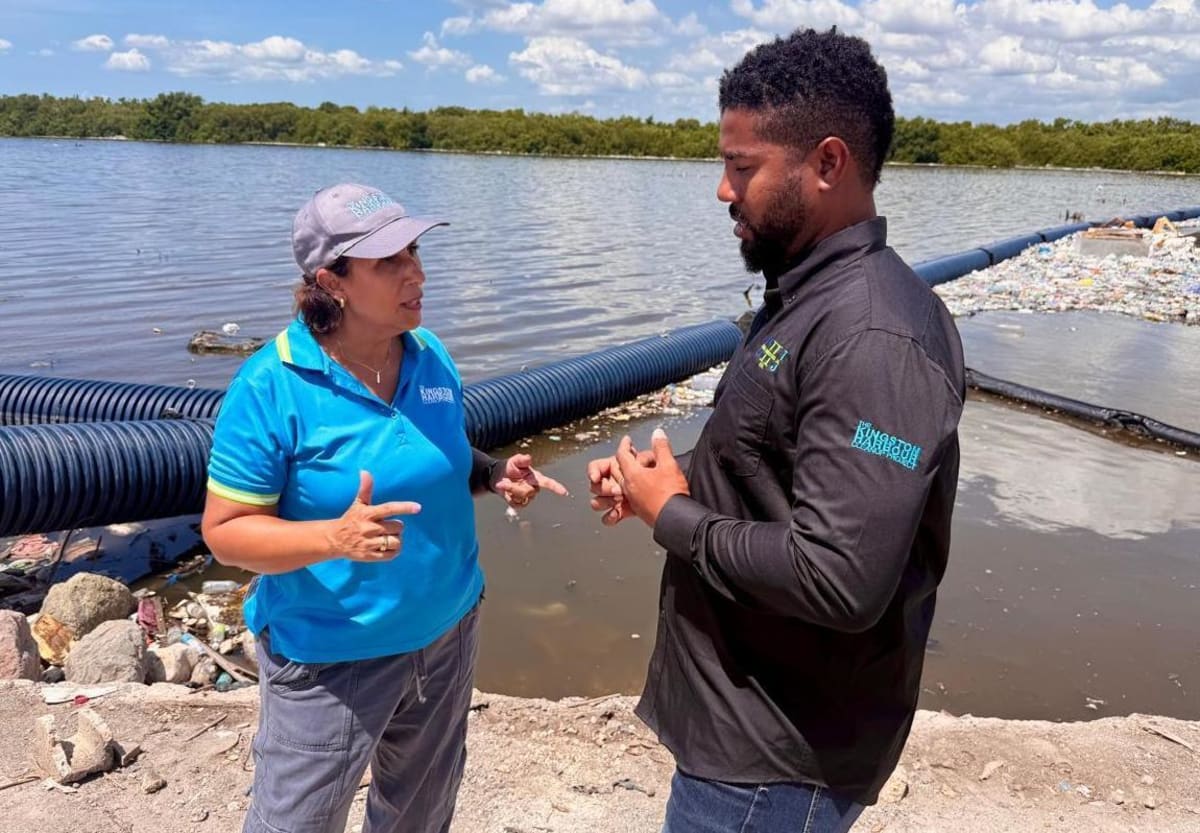 Caroline Mahfood and Michael McCarthy presenting Kingston Harbour cleanup initiative results in Jamaica