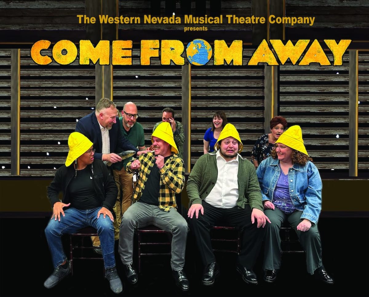 Theater stage with performers in "Come From Away" musical about Gander Newfoundland 9/11 kindness