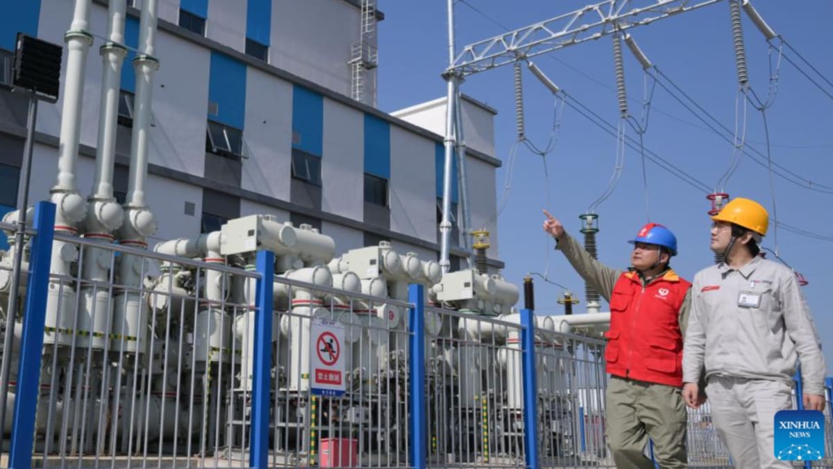 Large industrial power facility built into former salt mine with storage tanks and equipment
