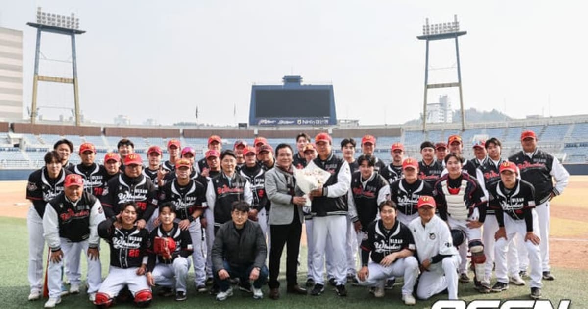 Ulsan Whales baseball players celebrating their first historic victory on the field together