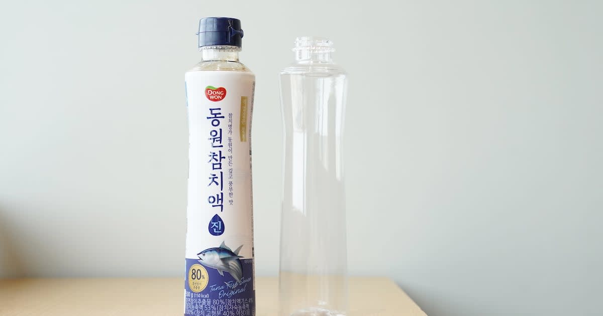 Close-up of new Dongwon liquid container showing redesigned plastic bottle mouthpiece