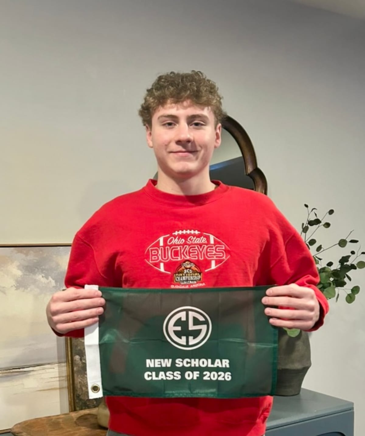 High school student Dominic Kovi standing at Westwood Country Club golf course in Rocky River, Ohio