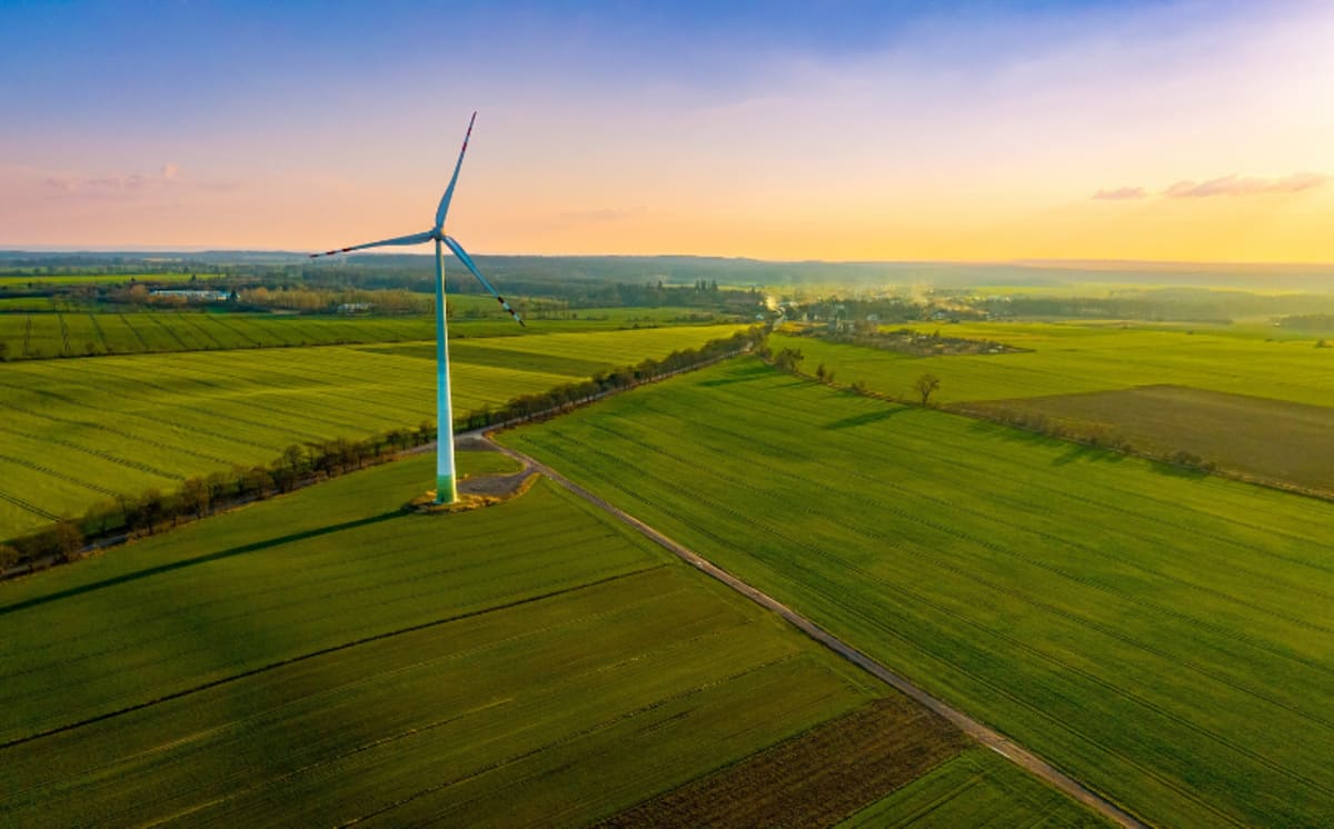 Massive wind turbines in New Mexico desert connected to long-distance transmission lines
