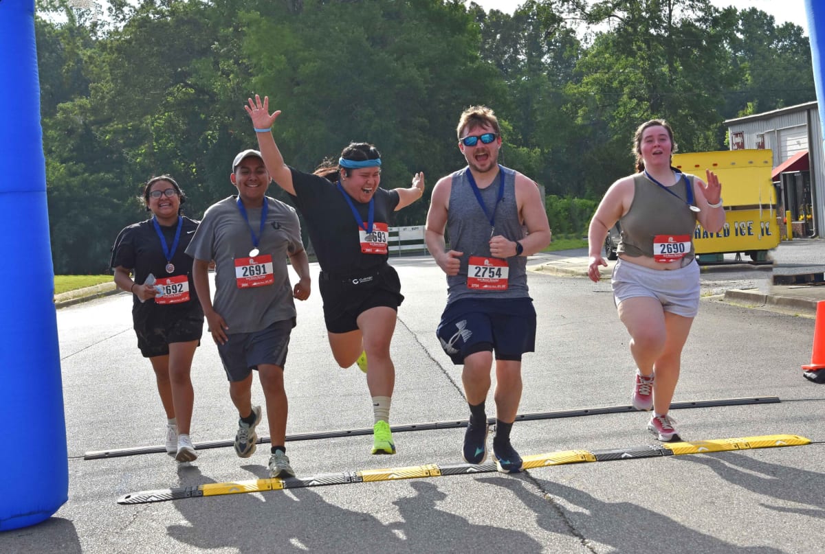 Runners gathered at starting line of inaugural Run for Good 5K charity race in Alabama