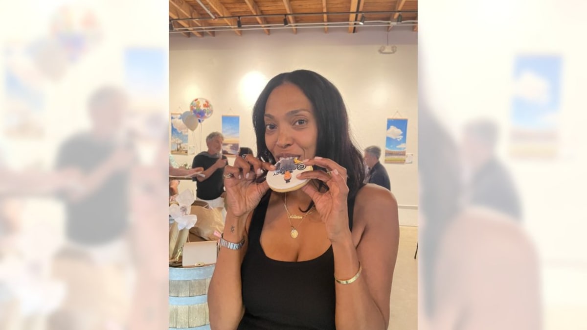 Allison Hales smiling at Culture Brewing Co. in Manhattan Beach during Community Hero celebration event