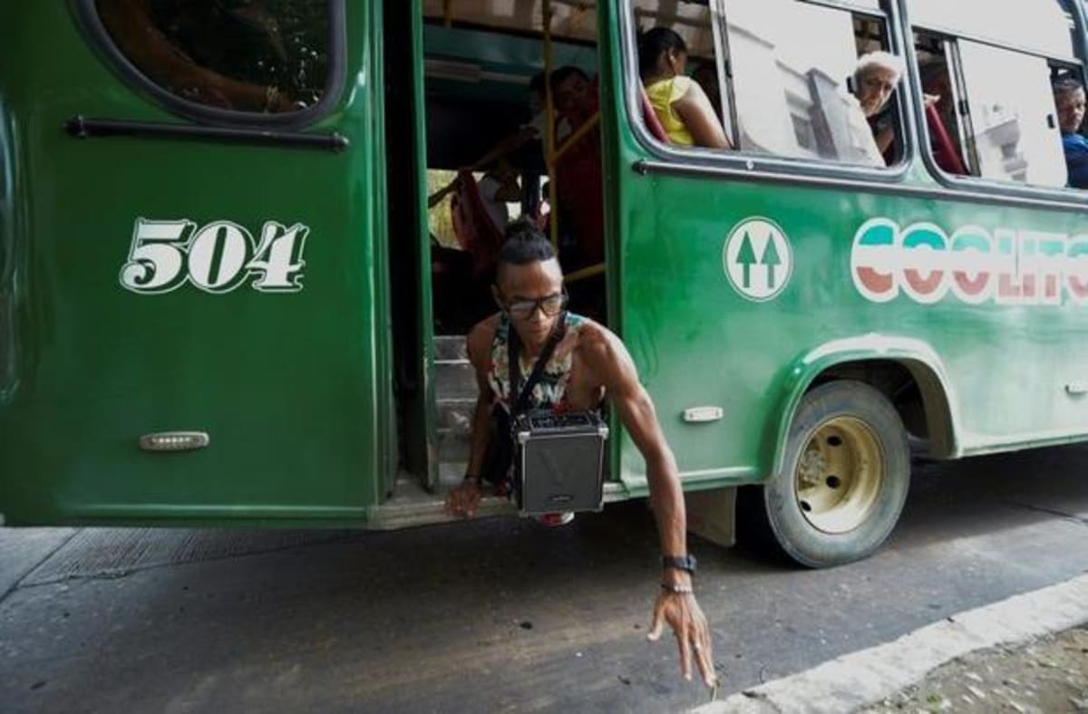 Legless Venezuelan Rapper Surfs, Sings, Inspires in Colombia