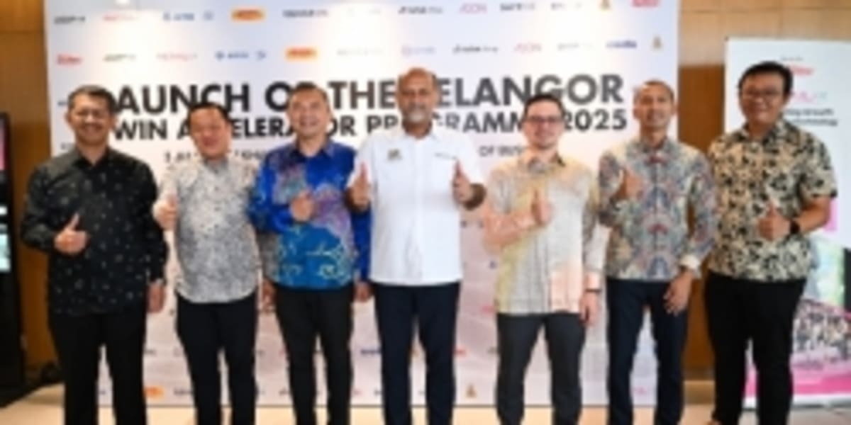 Small retail business owners in Malaysia learning digital sales technology during training workshop