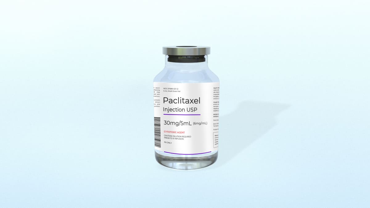 ** Microscopic view of cancer cells being targeted by advanced drug delivery system