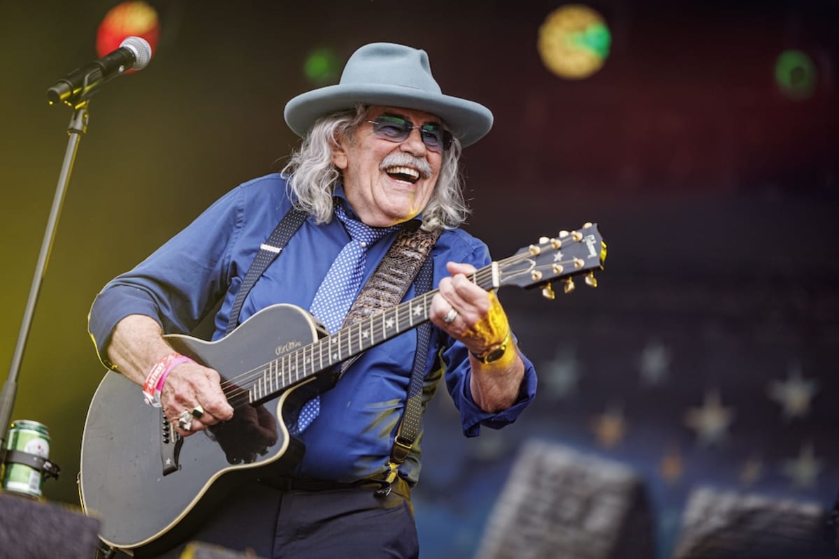 Elderly rock musician Bennie Jolink performing on stage with Normaal band in the Netherlands