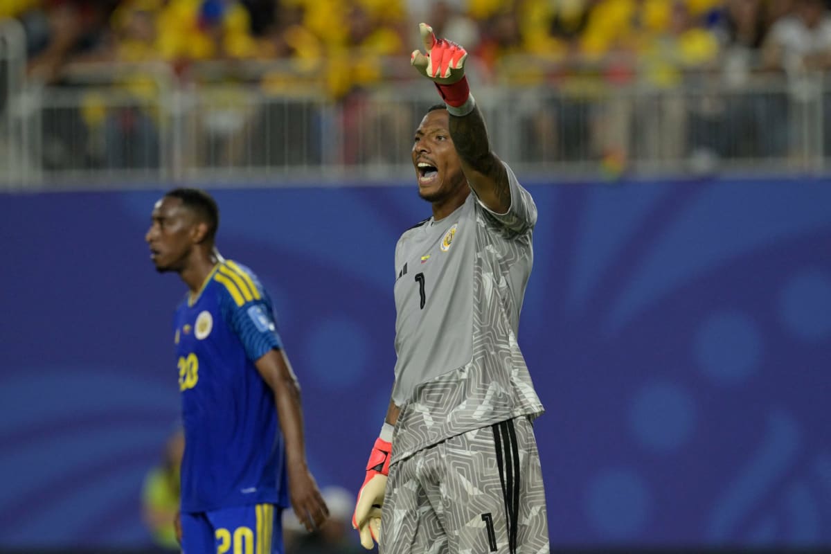 Goalkeeper Eloy Room celebrates after making 15 saves for Curaçao against Ecuador