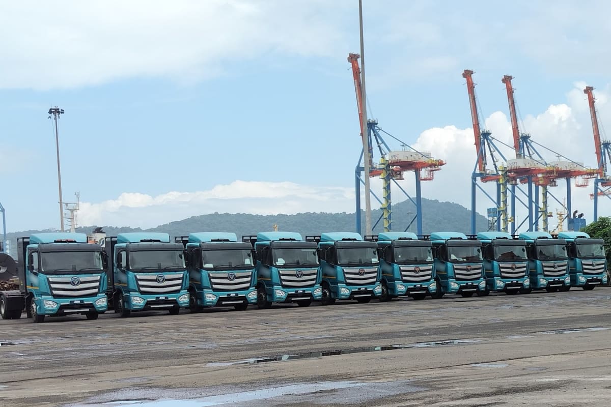 Heavy-duty electric truck at an Indian shipping port loading facility