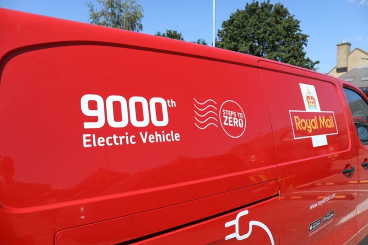 Royal Mail electric delivery van in signature red livery parked at Colchester office