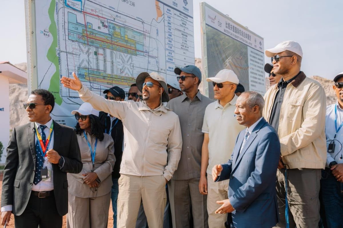Aerial view of Bishoftu International Airport under construction in Ethiopia with cranes and workers