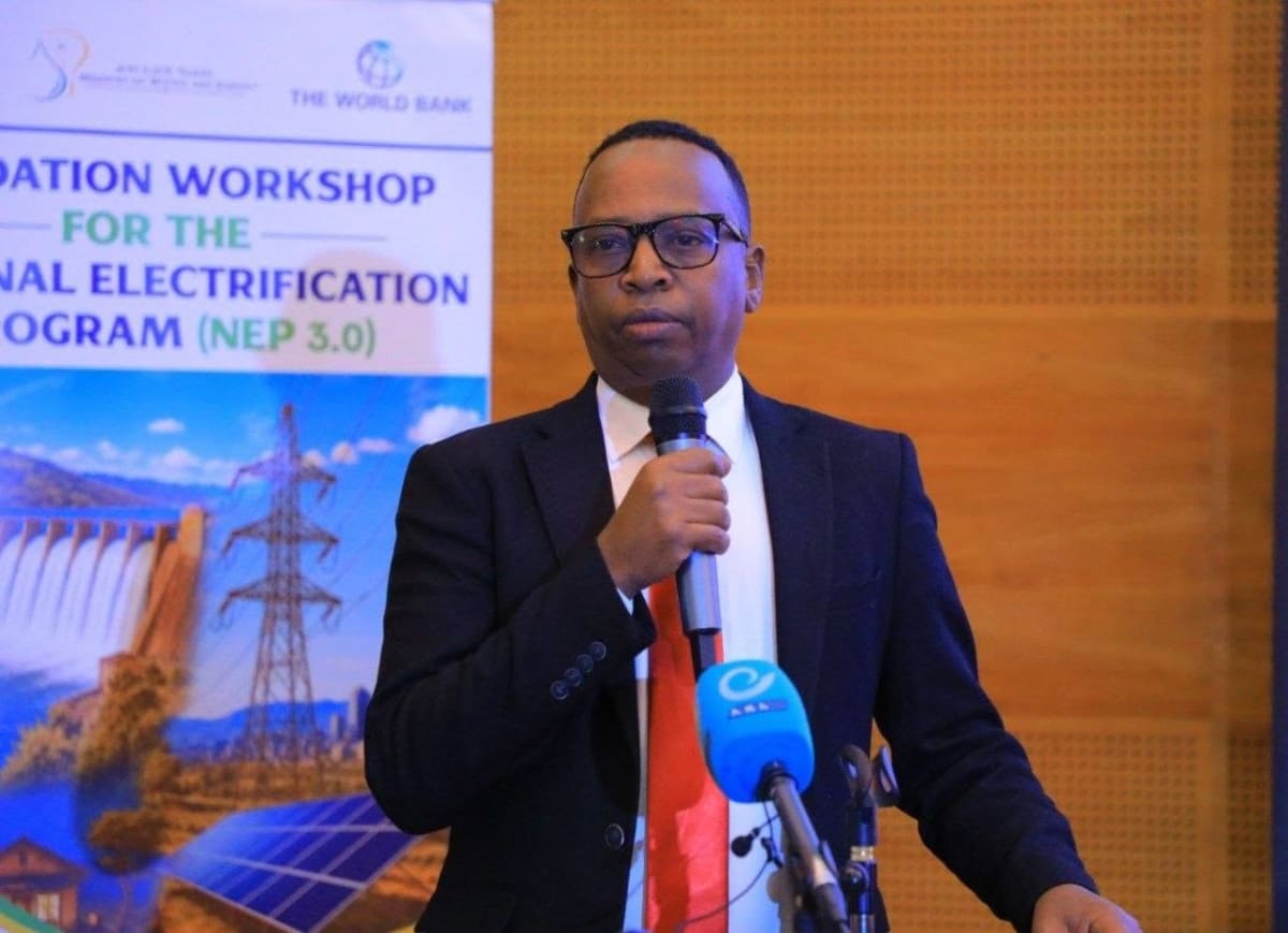 Ethiopian community members celebrating new electrical infrastructure connecting their village to renewable power grid