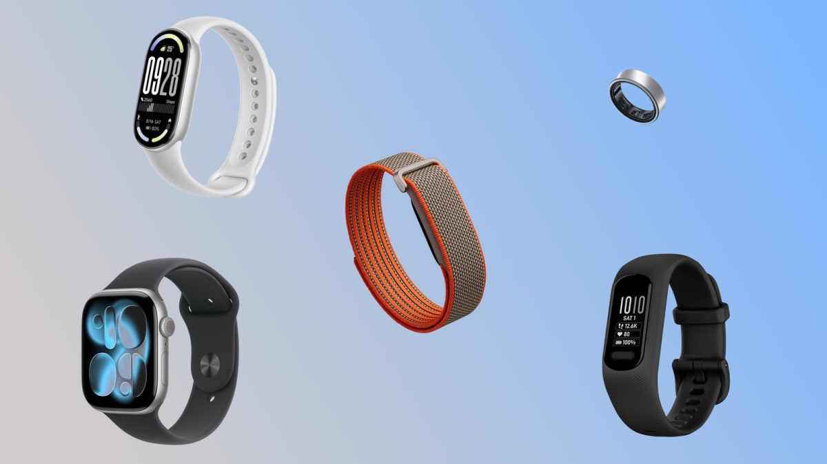 Fitbit Air screenless fitness tracking band worn on wrist showing sleek black design