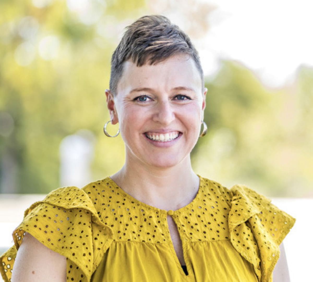 Whitney Brown-Tompkins smiling, honored as Good Samaritan of the Year for wound care services