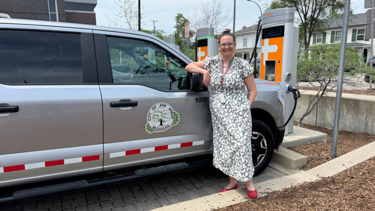Electric vehicle charging at a public charging station in Ann Arbor, Michigan