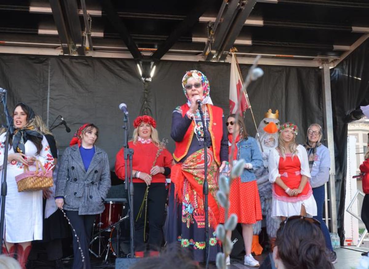 Bride and groom exchanging vows during Dyngus Day street festival in Cleveland