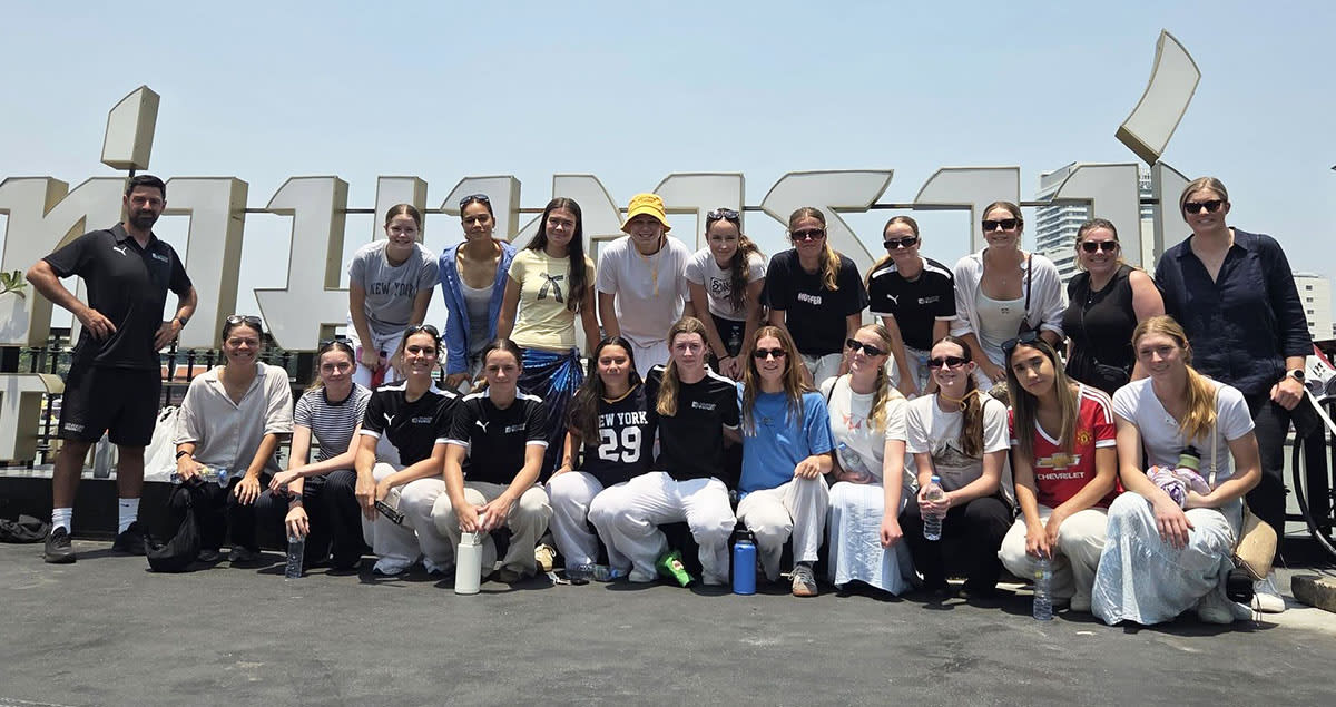 New Zealand U-19 girls football team posing together in matching uniforms during Thailand tour