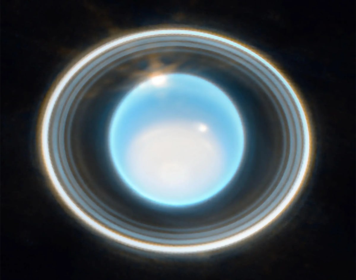 James Webb Space Telescope image showing Uranus's rings with newly discovered tiny moon highlighted