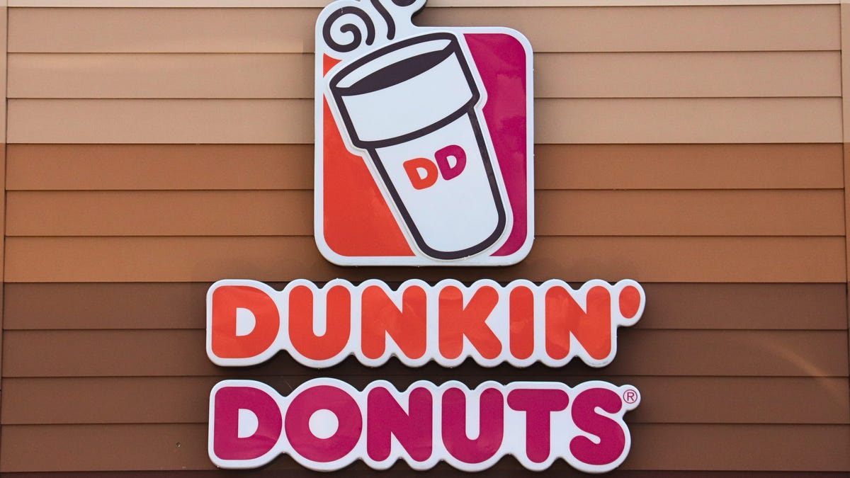 Dunkin' Opens in Harlem with $20K for Therapy Dog Program