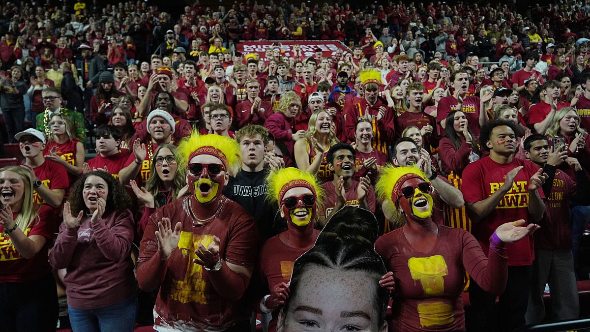 Iowa State Cyclones fans celebrating record-breaking donations supporting student athletes in cardinal and gold
