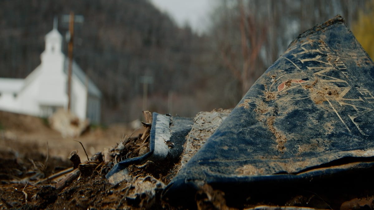 Film crew interviewing Tropical Storm Helene survivors in mountainous Yancey County North Carolina
